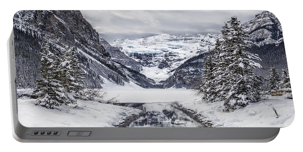 Lake Louise Portable Battery Charger featuring the photograph In The Heart Of The Winter by Evelina Kremsdorf