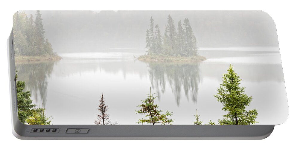 Island Portable Battery Charger featuring the photograph Island in the fog by Les Palenik