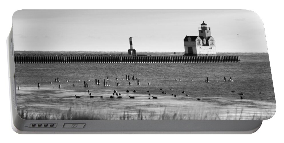 Lighthouse Portable Battery Charger featuring the photograph Kewaunee Lighthouse in BandW by Bill Pevlor