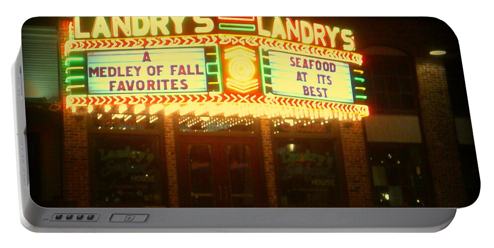  Portable Battery Charger featuring the photograph Landry's Seafood in Lomoish by Kelly Awad
