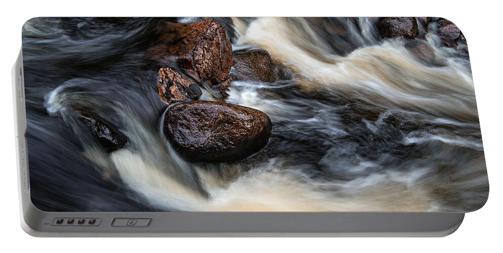 Canada Portable Battery Charger featuring the photograph Like a Rock by Doug Gibbons