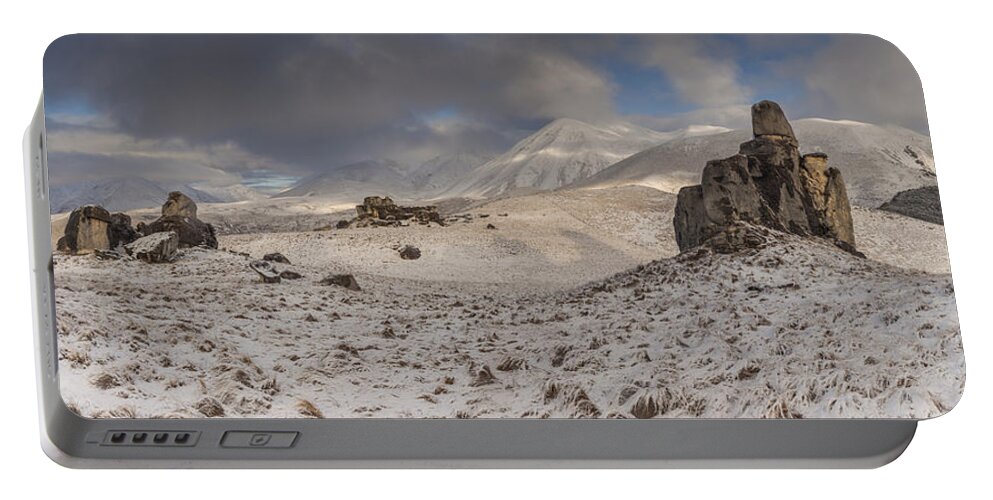 Colin Monteath Portable Battery Charger featuring the photograph Limestone Boulders And Snow by Colin Monteath