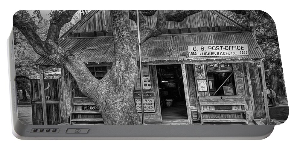 Luckenbach Portable Battery Charger featuring the photograph Luckenbach 2 Black and White by Scott Norris
