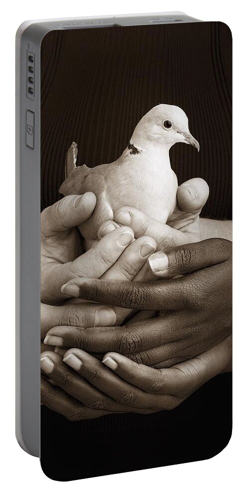 Teamwork Portable Battery Charger featuring the photograph Many Hands Holding A Dove by Ron Nickel
