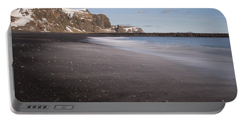 Vik Portable Battery Charger featuring the photograph Memories In The Black Sand by Evelina Kremsdorf