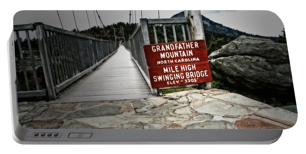 Swinging Bridge Portable Battery Charger featuring the photograph Mile High by Karol Livote