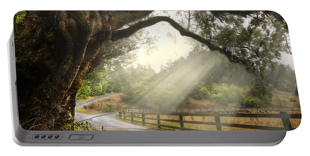 Clouds Portable Battery Charger featuring the photograph Morning Light by Debra and Dave Vanderlaan