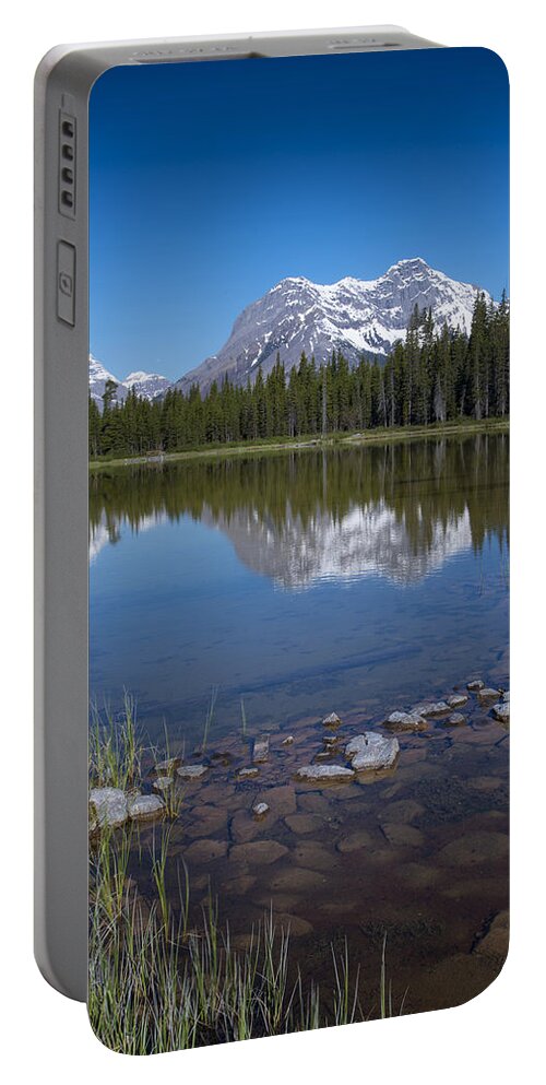 Mountain Portable Battery Charger featuring the photograph Mountain Lake in Kananaskis Alberta by Bill Cubitt