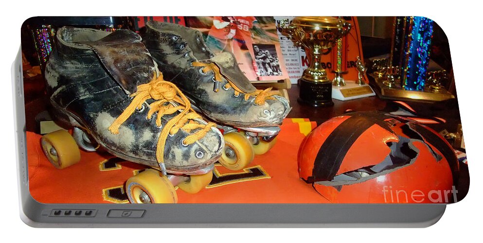 Jim Fitzpatrick Portable Battery Charger featuring the photograph My Battle Scarred Roller Derby Skates and Helmet  by Jim Fitzpatrick