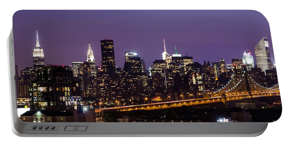 New York Portable Battery Charger featuring the photograph New York by night by Agnes Caruso