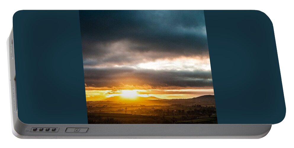 Evening Portable Battery Charger featuring the photograph Northern Ireland by Aleck Cartwright