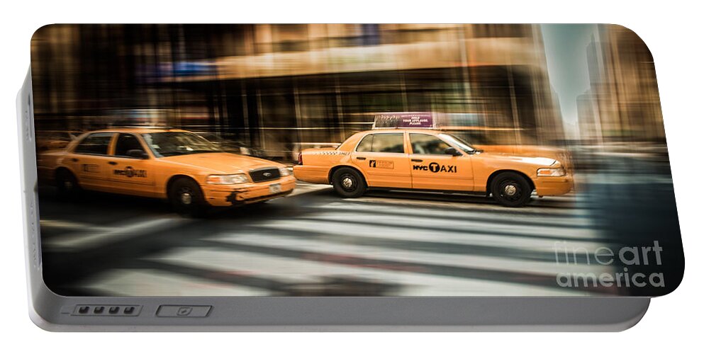 Nyc Portable Battery Charger featuring the photograph NYC Yellow Cabs by Hannes Cmarits