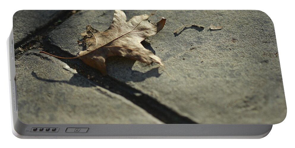 Fall Portable Battery Charger featuring the photograph Oak Leaf on Autumn Sidewalk by Valerie Collins