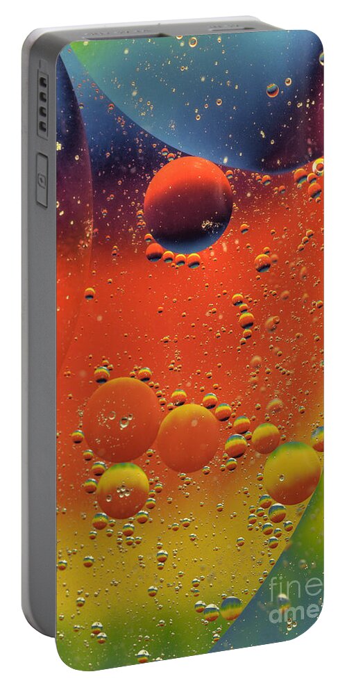 Abstract Portable Battery Charger featuring the photograph Oil and Water by Anthony Sacco