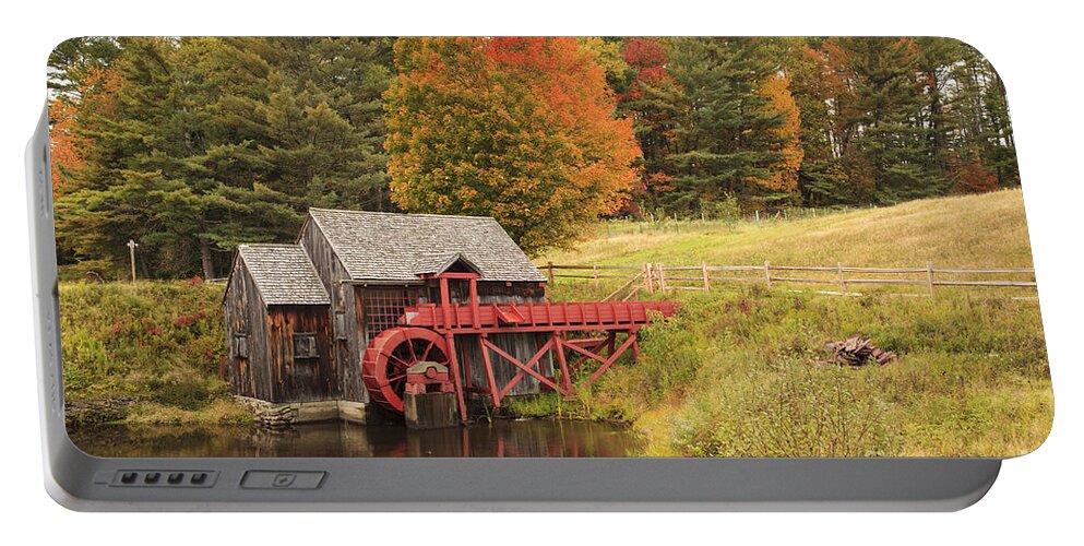 New England Portable Battery Charger featuring the photograph Old New England grist mill in Autumn by Ken Brown