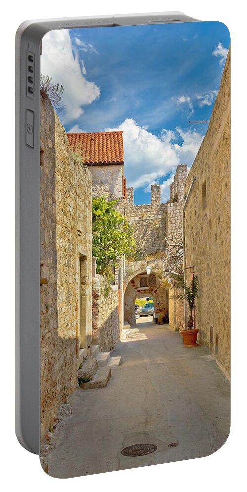 Hvar Portable Battery Charger featuring the photograph Old stone narrow street of Hvar by Brch Photography