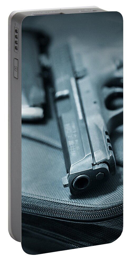 Armed Portable Battery Charger featuring the photograph On the Lam by Trish Mistric