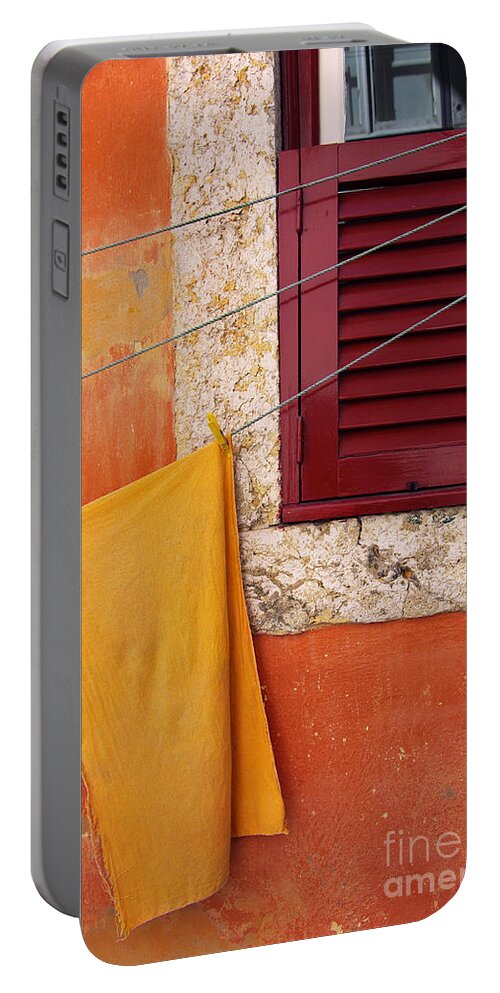 Aged Portable Battery Charger featuring the photograph Orange Cloth by Carlos Caetano