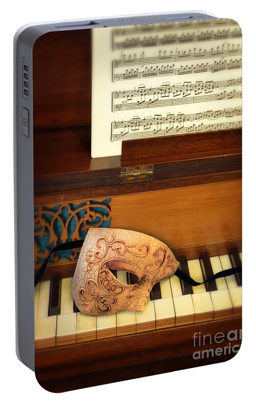 Piano Portable Battery Charger featuring the photograph Ornate Mask on Piano Keys by Jill Battaglia