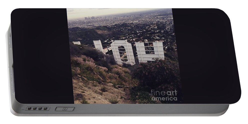 Hollywood Portable Battery Charger featuring the photograph Peek by Denise Railey