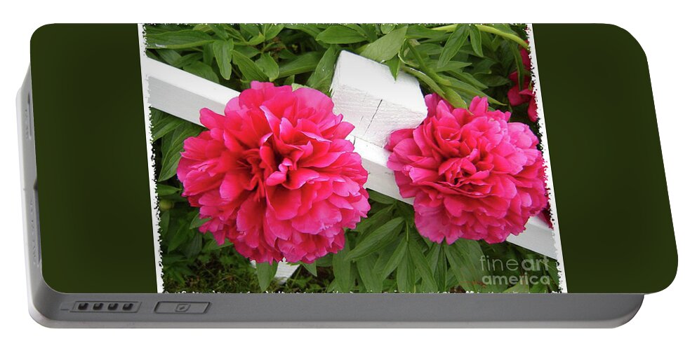 Resting Flowers Portable Battery Charger featuring the photograph Peonies Resting on White Fence by Barbara A Griffin