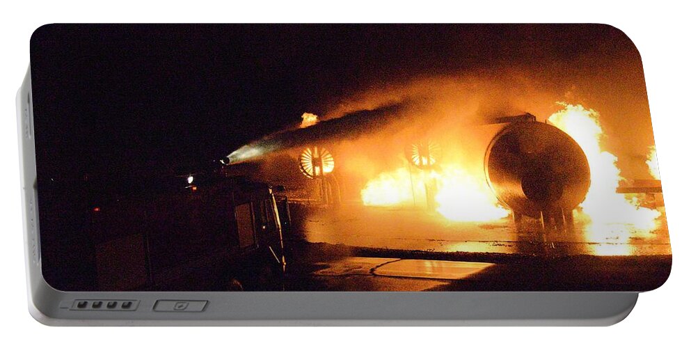 Fire Portable Battery Charger featuring the photograph Plane Burning by Aaron Martens