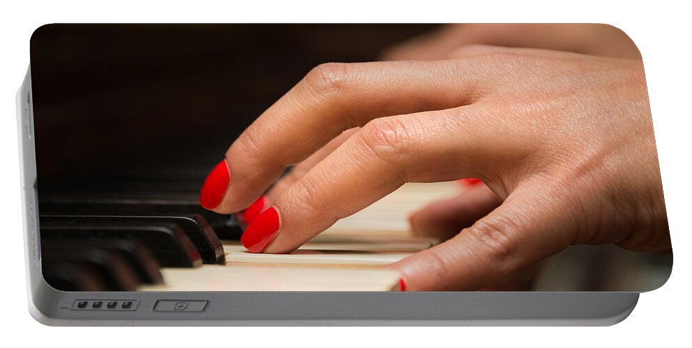 Music Portable Battery Charger featuring the photograph Playing the piano by Dutourdumonde Photography