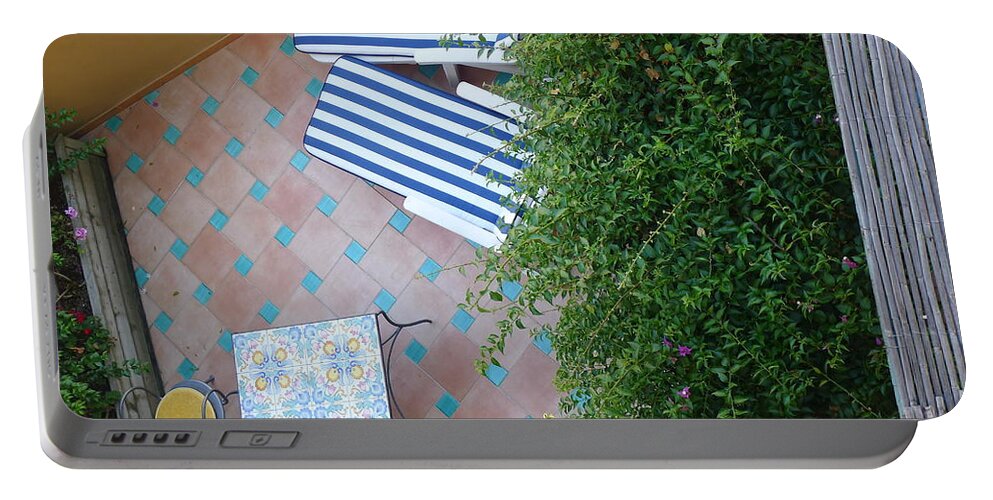  Portable Battery Charger featuring the photograph Positano - Balcony View - Lounge Chairs by Nora Boghossian