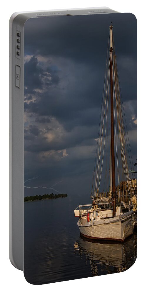 Sailboat Portable Battery Charger featuring the photograph Preparing For The Storm by Flees Photos