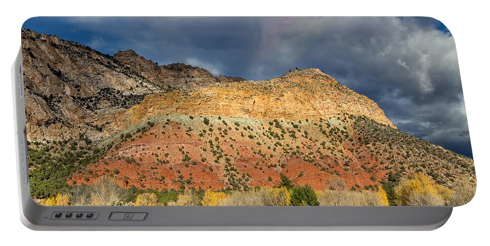 Ashley National Forest Portable Battery Charger featuring the photograph Rainbow Touching the Mountain by Kathleen Bishop