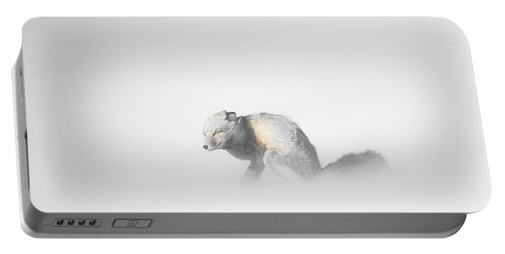 Yellowstone Portable Battery Charger featuring the photograph Red Fox in Winter Storm by Bill Cubitt