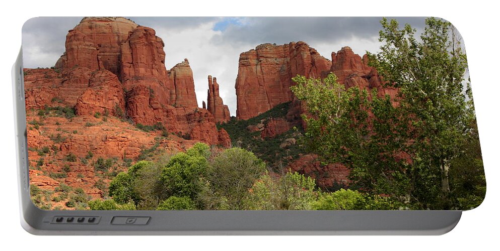 Sandstone Portable Battery Charger featuring the photograph Red Rocks of Sedona with Spring Trees by Carol Groenen
