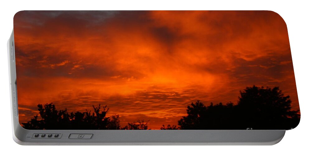 Red Sunset Portable Battery Charger featuring the photograph Red Sunset by Jeremy Hayden