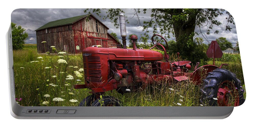 Tractor Portable Battery Charger featuring the photograph Reds in the Pasture by Debra and Dave Vanderlaan