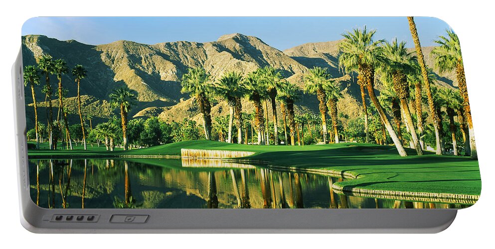Photography Portable Battery Charger featuring the photograph Reflection Of Trees On Water In A Golf by Panoramic Images