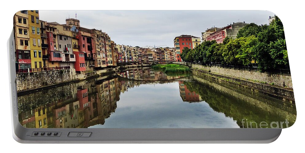 Reflection Portable Battery Charger featuring the photograph River Reflections in Girona, Spain by Marguerita Tan