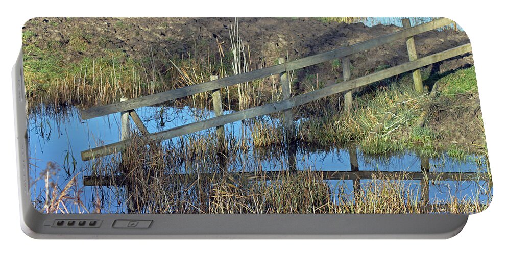 Landscapes Portable Battery Charger featuring the photograph Reflections of a Fence by Tony Murtagh