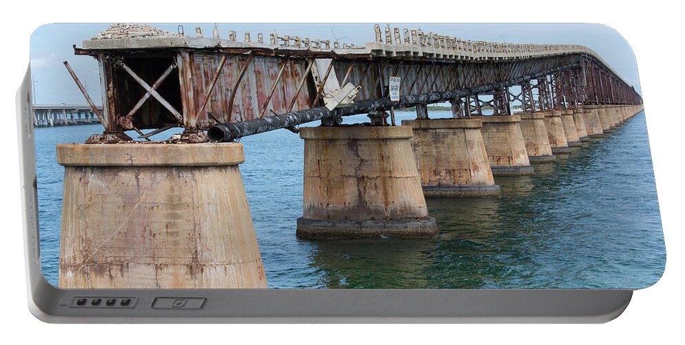 America Portable Battery Charger featuring the photograph Relic of the Old Florida Keys Overseas Railroad by John M Bailey