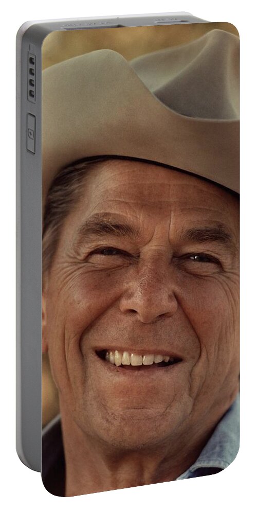 Regan Portable Battery Charger featuring the photograph Ronald Reagan in 1976 at his home at Rancho del Cielo by Movie Poster Prints