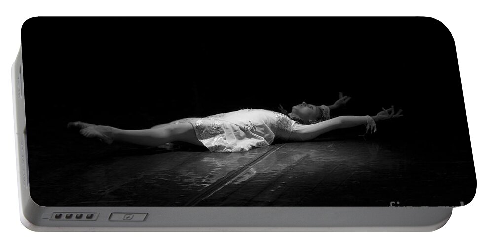 Ballerina Portable Battery Charger featuring the photograph Russian Ballerina as a Melting Snowflake. by Clare Bambers