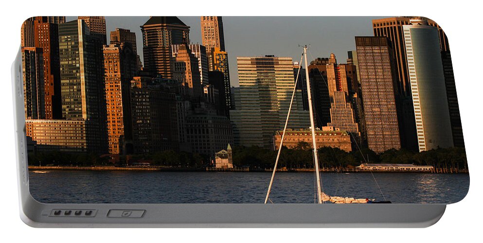 Sail Portable Battery Charger featuring the photograph Sailboat in NY Harbor by Eleanor Abramson