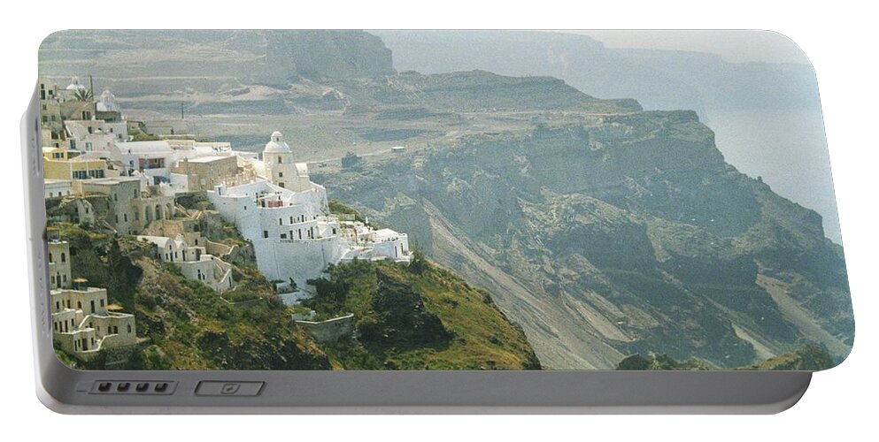 Santorini Greece Cliff Top White Buildings Portable Battery Charger featuring the photograph Santorini by Susie Rieple