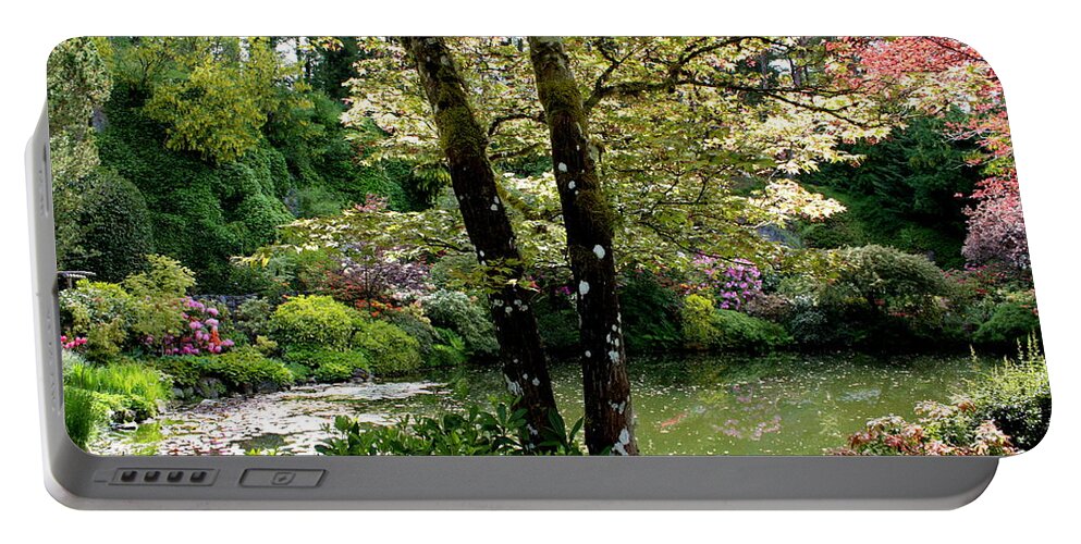 Peaceful Gardens Portable Battery Charger featuring the photograph Serene Garden Retreat by Carol Groenen