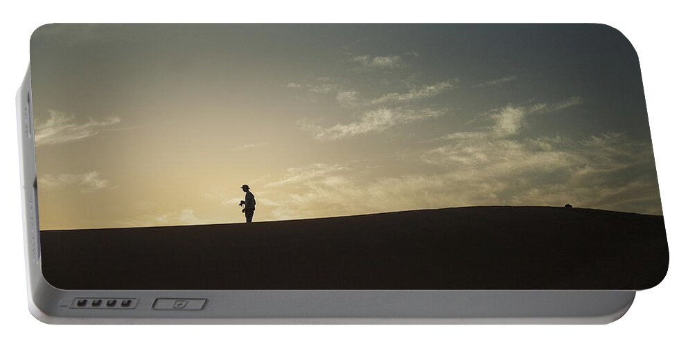Sahara Portable Battery Charger featuring the photograph Silhouette in the Sahara by Patricia Hofmeester