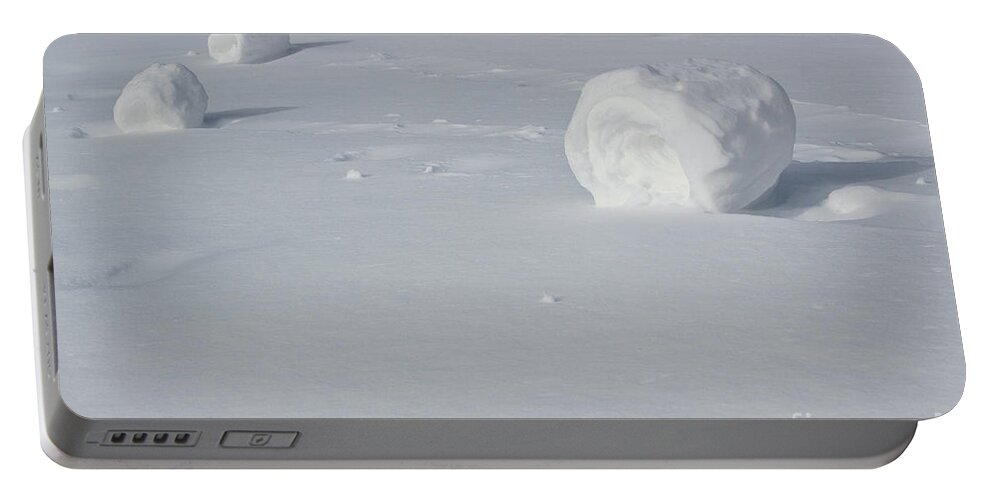 Winter Portable Battery Charger featuring the photograph Snow Roller Trio by Karen Adams