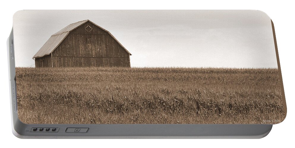 Barn Portable Battery Charger featuring the photograph Solitary by Andrea Platt
