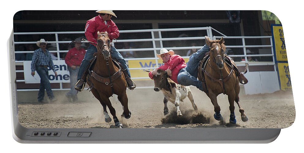 Calgary Portable Battery Charger featuring the photograph Steer Wrestling by Bill Cubitt