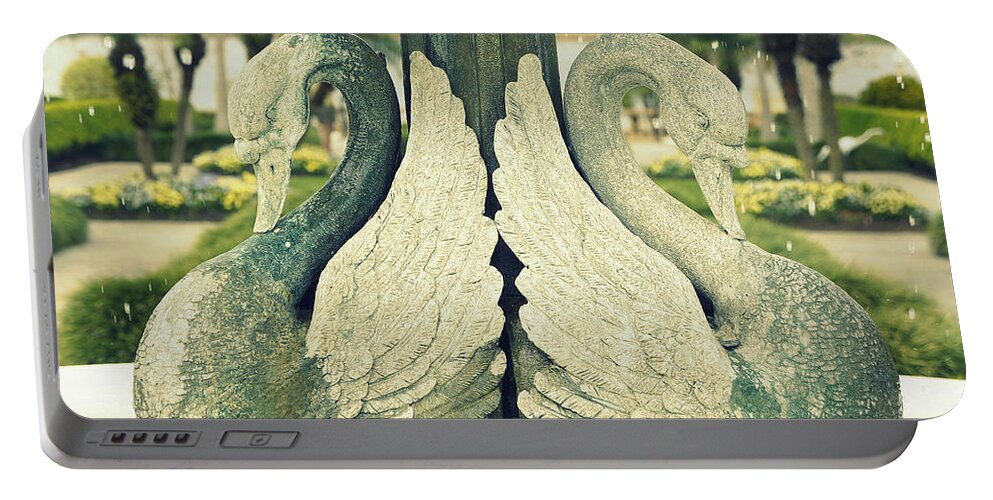 Water Portable Battery Charger featuring the photograph Stone Swans in the Rain by Laurie Perry