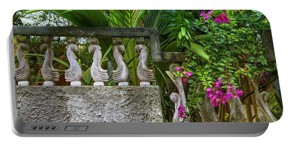 Garden Portable Battery Charger featuring the photograph Stony Wall In The Garden by Gina Koch