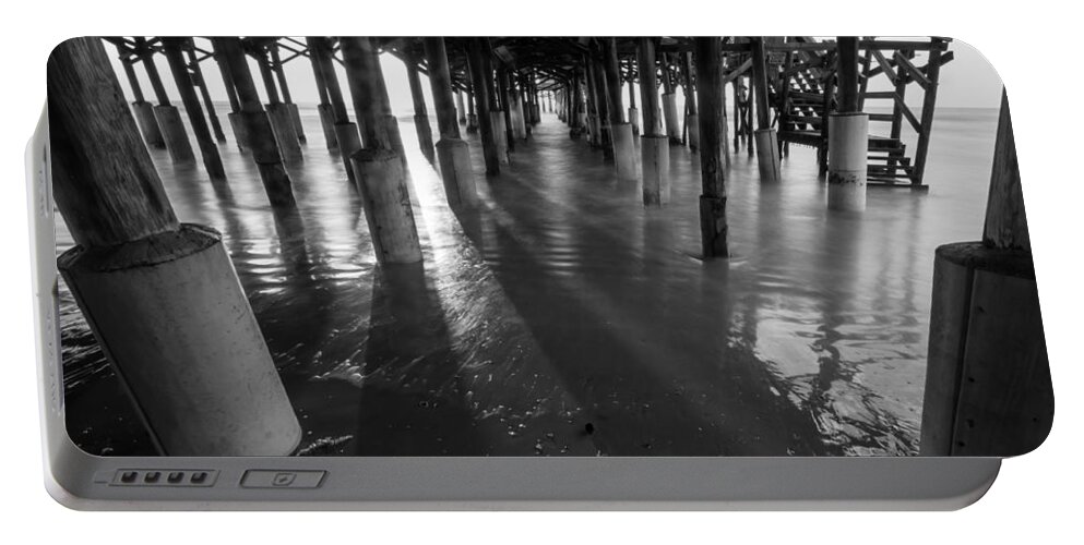 Florida Portable Battery Charger featuring the photograph Sunrise under Pier by Stefan Mazzola